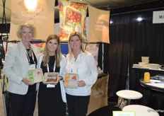 Shannon Boase, Christie Nikolai and Rhonda Sanders with CKF, Inc. proudly show Earthcycle’s new designs for home compostable packaging.